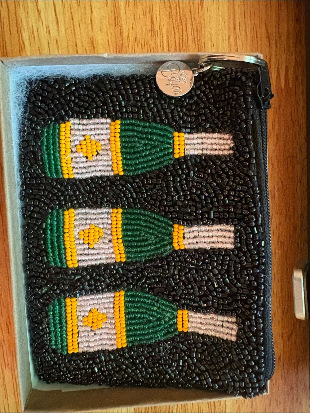 Beaded coin purse with champagne design